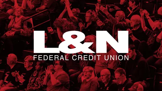 L&N Federal Credit Union logo appears over a crowd of UofL fans.