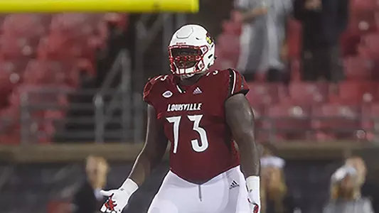 Mekhi Becton awaits the snap
