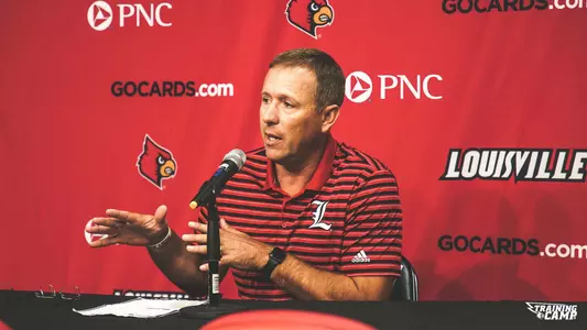 Scott Satterfield talks to the media before the start of camp
