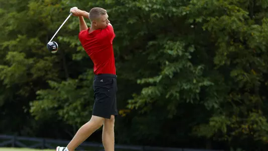 Matthias Schmid hits one down the middke