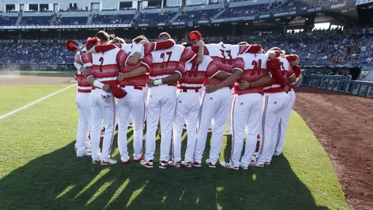 Baseball team huddle in Omaha at the 2019 College World Series.