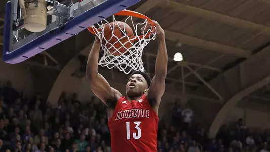 UofL freshman David Johnson dunks in the first half of the Cardinals' victory at Duke.
