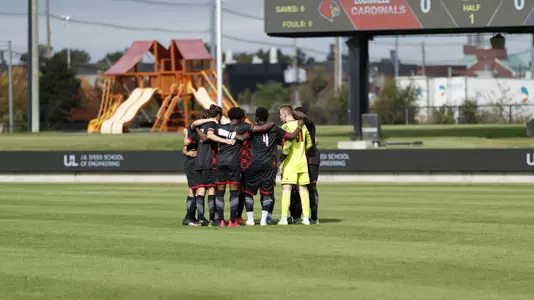 The Cardinals huddle before the match against Pitt at Lynn Stadium.