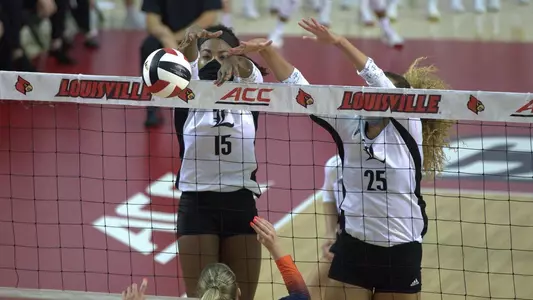 Aiko Jones and Amaya Tillman block Syracuse