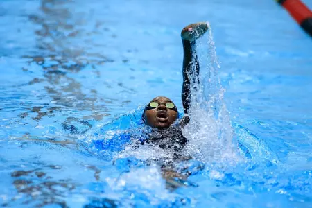 Tristen Ulett swims the backstroke.