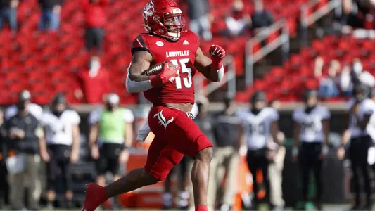 FB: Jalen Mitchell runs to the end zone during the game against Wake Forest at Cardinal Stadium on December 12.