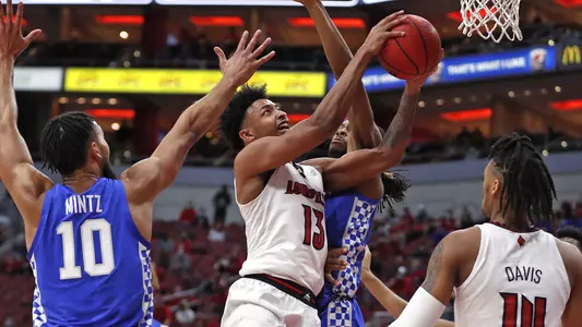 David Johnson works inside against Kentucky in the KFC Yum! Center on Dec. 26