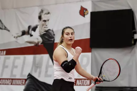 Nina Jovic fist pumps after a win