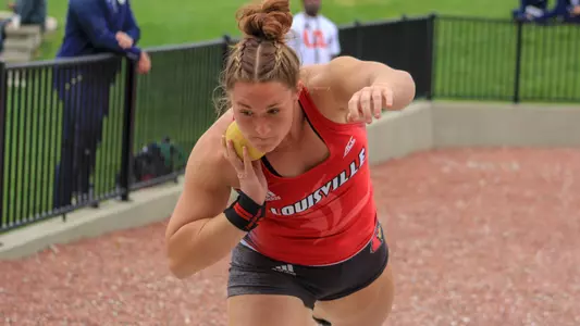Victoria Farley throws the shot put during outdoor season