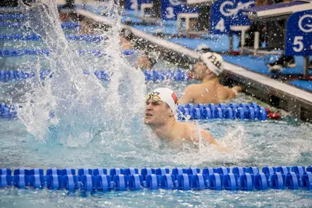 Michael Eastman splashes in celebration