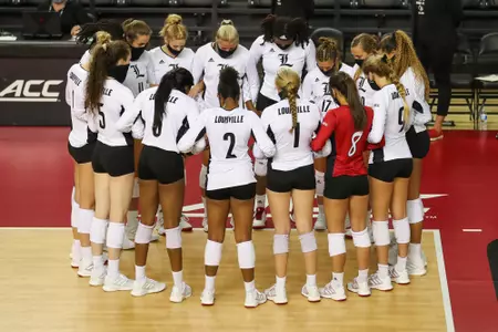 The Cardinals huddle as a team before the match against Notre Dame.