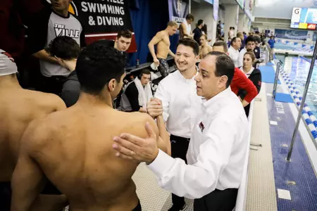 Arthur Albiero congratulates the relay team