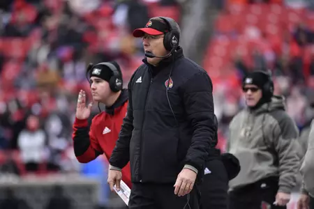 Louisville head coach Scott Satterfield watches the action during the second half of an NCAA college football game against Syracuse in Louisville, Ky., Saturday, Nov. 13, 2021. Louisville won 41-3. (AP Photo/Timothy D. Easley)