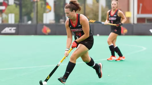 Alli Bitting dribbles the ball