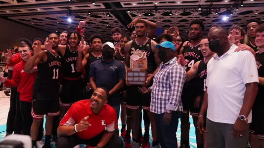 The Cardinals celebrate after winning the Bahamas Championship.