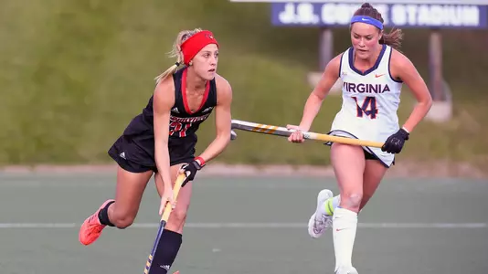 Erica Cooper dribbles the ball against Virginia