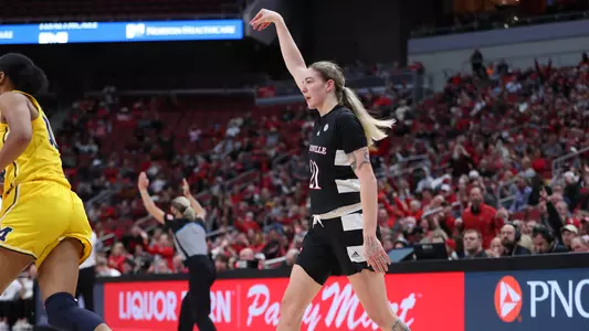 Emily Engstler celebrates after a three-pointer vs. Michigan
