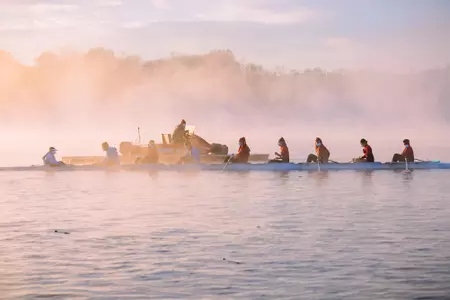 Rowing action in the early morning fog