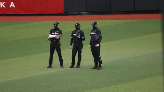 Trey Leonard, Luke Brown and Levi Usher in the outfield at Jim Patterson Stadium.