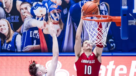 Samuell Williamson dunks during the game at Duke on Feb. 27, 2021