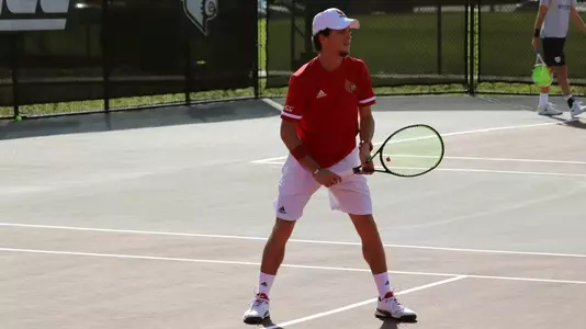 Matthew Fung on the court in the match against Butler