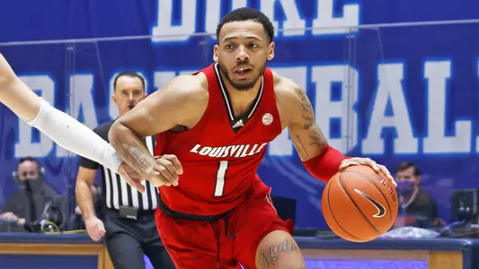 Carlik Jones drives against Duke in Cameron Indoor Stadium on Feb. 27, 2021