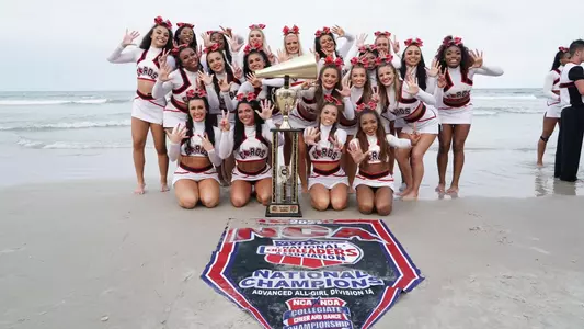 Small Coed Cheer Squad Celebrate National Champioship