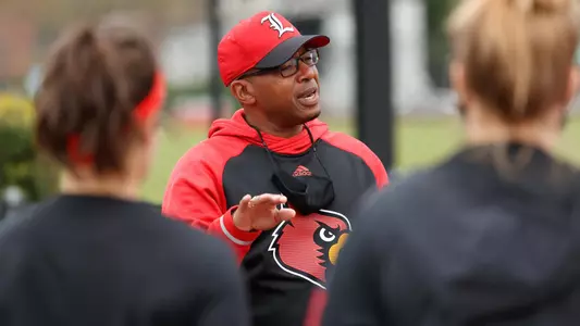 Mark Beckham addresses the team in pre-match