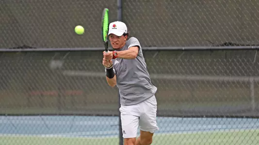 Matthew Fung returns the ball against Belmont
