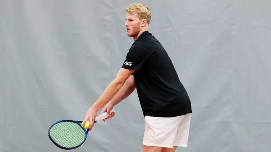 Josh Howard-Tripp prepares to serve the ball