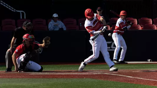 Michael Lippe hitting in the 2022 Pizza Bowl.