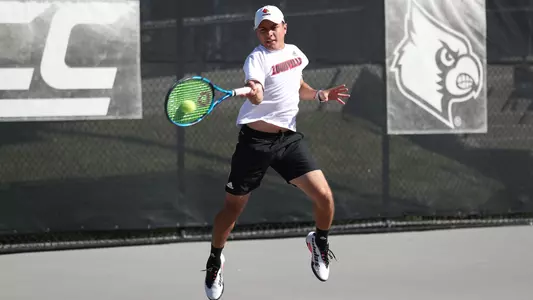 Sergio Hernandez returns the ball