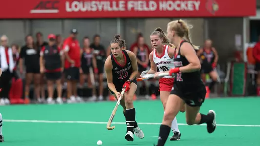 Mattie Tabor prepares to pass the ball to Mia Duchards in the win against Ball State