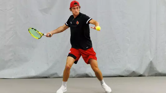 Will Mayew returns the ball at the Ohio Valley Regional