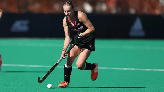 Aimee Plumb carries the ball against Boston College