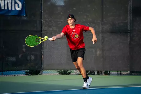 Will Mayew returns the ball at ITA National Fall Championships