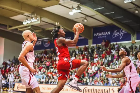 Kamari Lands drives to the basket against Arkansas in the Maui Invitational.