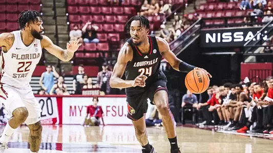 Jae'Lyn Withers drives against Florida State on Dec. 10, 2022.