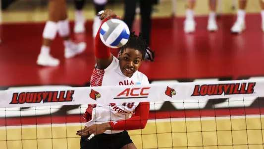 Aiko Jones hits from the right side against Samford