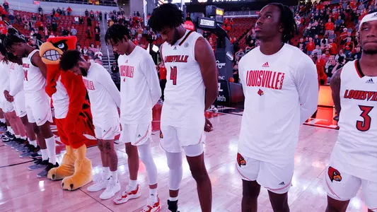 Players line up for the national anthem against Maryland in the ACC/Big Ten Challenge.