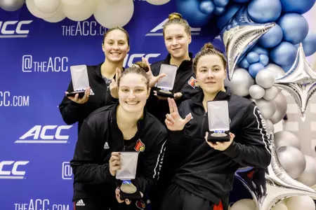 the 800 free relay team gets their medals