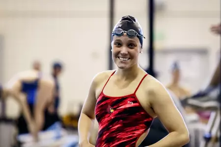 Morgan Friesen smiles on deck