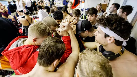 Cards huddle up before the session