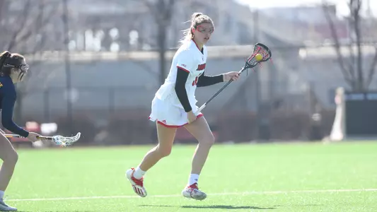 Madi McKee attacks the Marquette defense