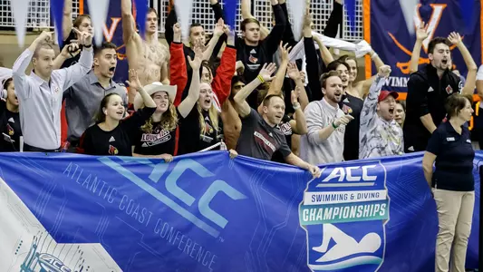 staff cheers on sidelines at ACCs