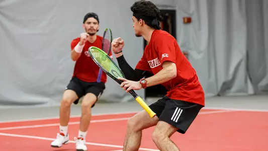 Natan Rodrigues and Matthew Fung celebrate after a point