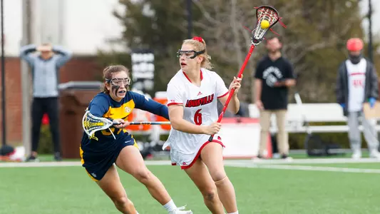Caroline Blalock takes on a Marquette Defender