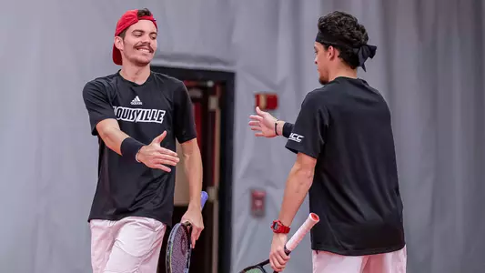 Natan Rodrigues and Matthew Fung celebrate after a point