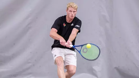 Josh Howard-Tripp returns a serve