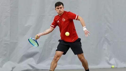 Sergio Hernandez returns a serve against Purdue